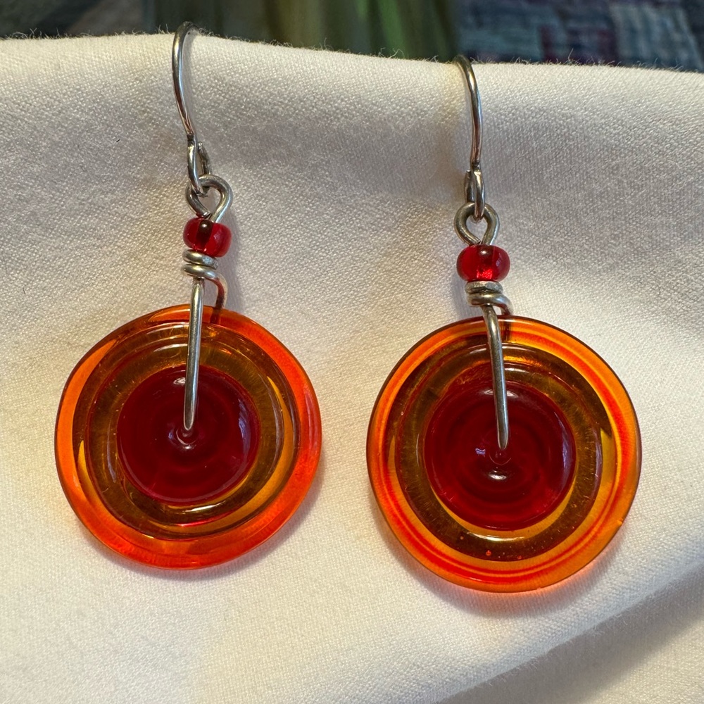 Eye Candy red & orange glass disc earrings, EUC. 925 silver disc on back.